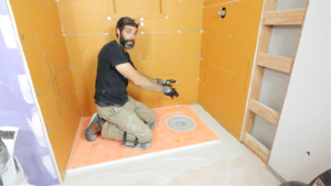 The Waterproofing Is Underneath: Why Schluter Shower Installers Matter